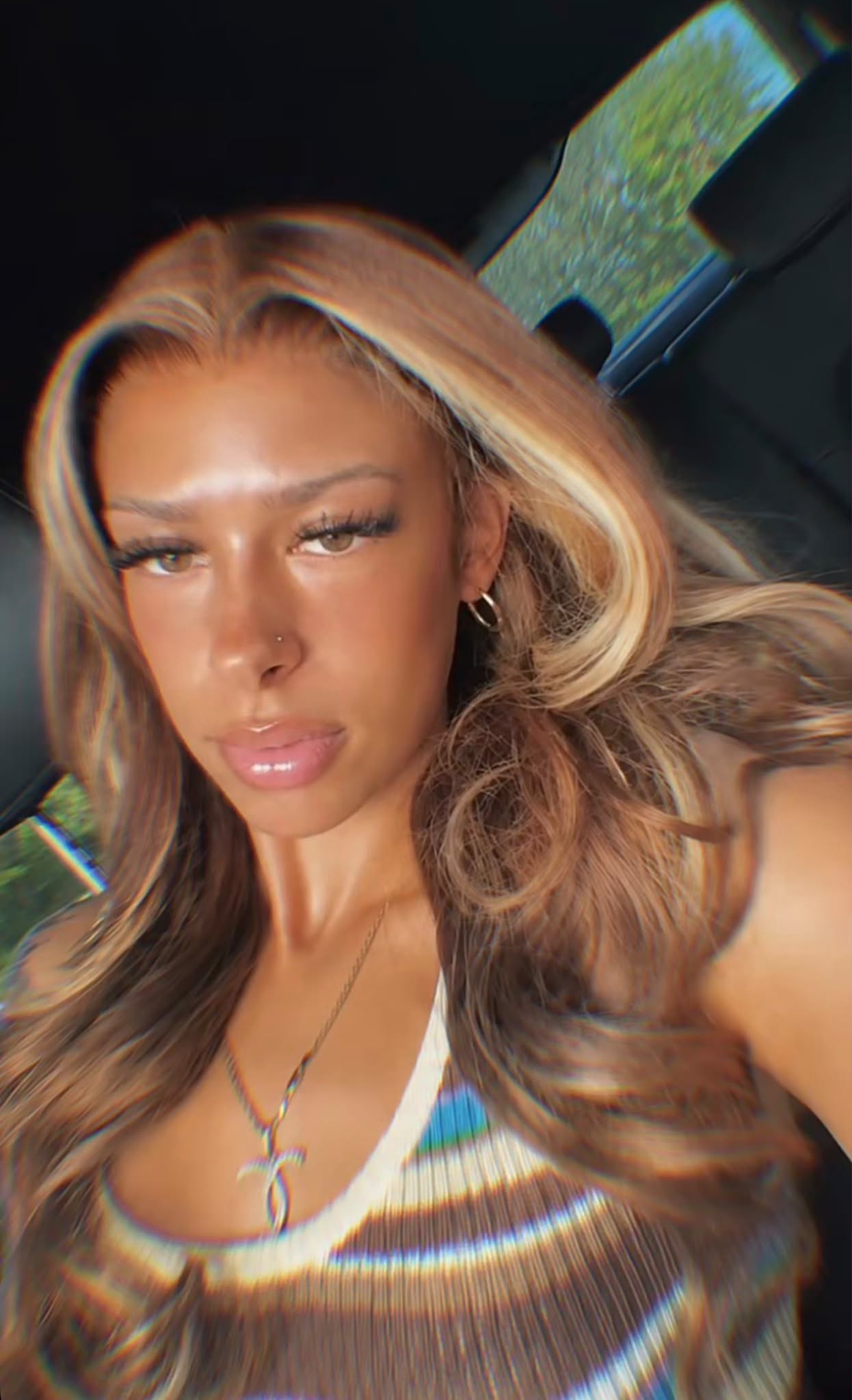 Customer with raw straight bundles coloured honey blonde